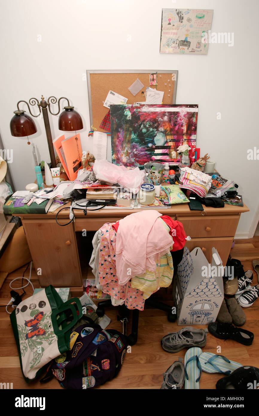 Teenage Girl Bedroom Desk Littered With Clothes And Belongings Usa