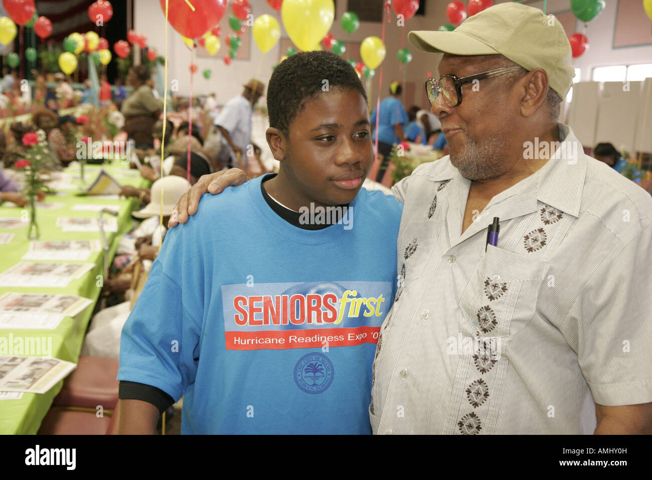 Miami Florida,Mahi Auditorium,Seniors First Hurricane Readiness Expo,Black male student students,volunteer volunteers volunteering work worker workers Stock Photo