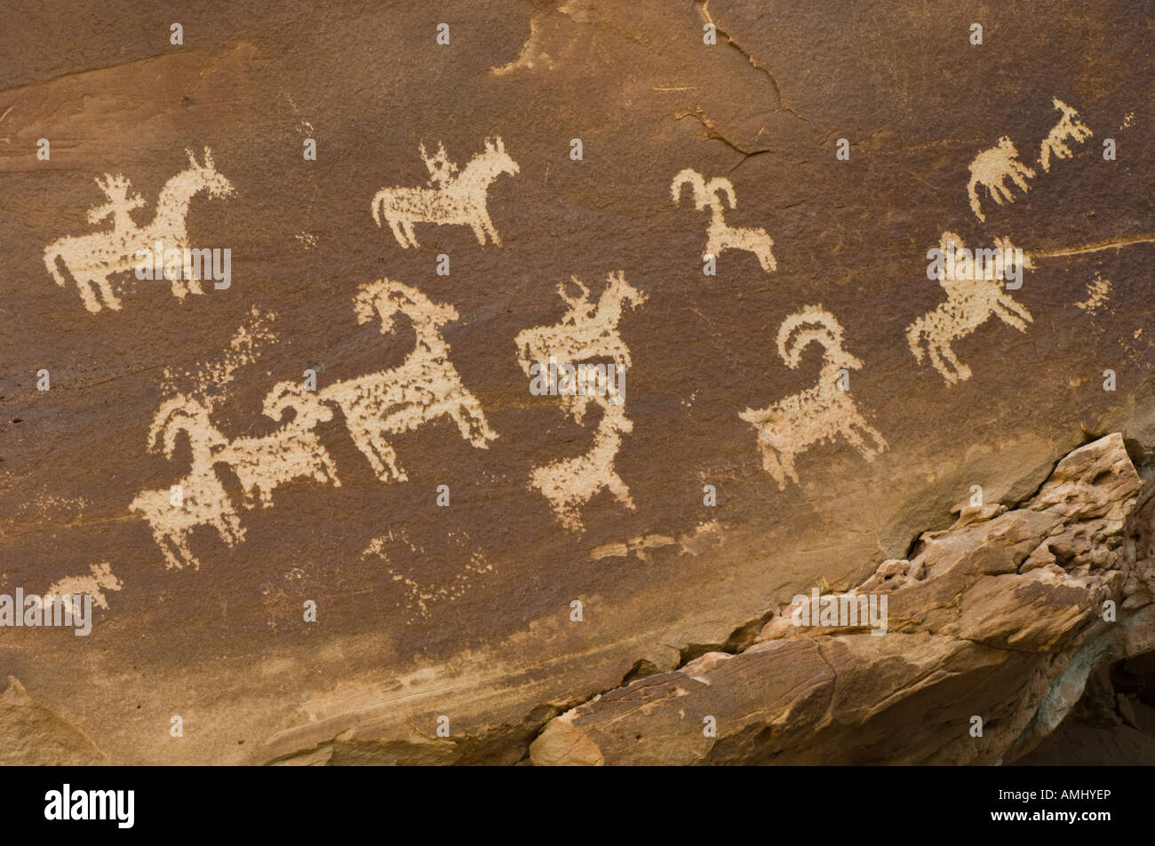 Indian rock art depicting horses and bighorn sheep at Arches National ...