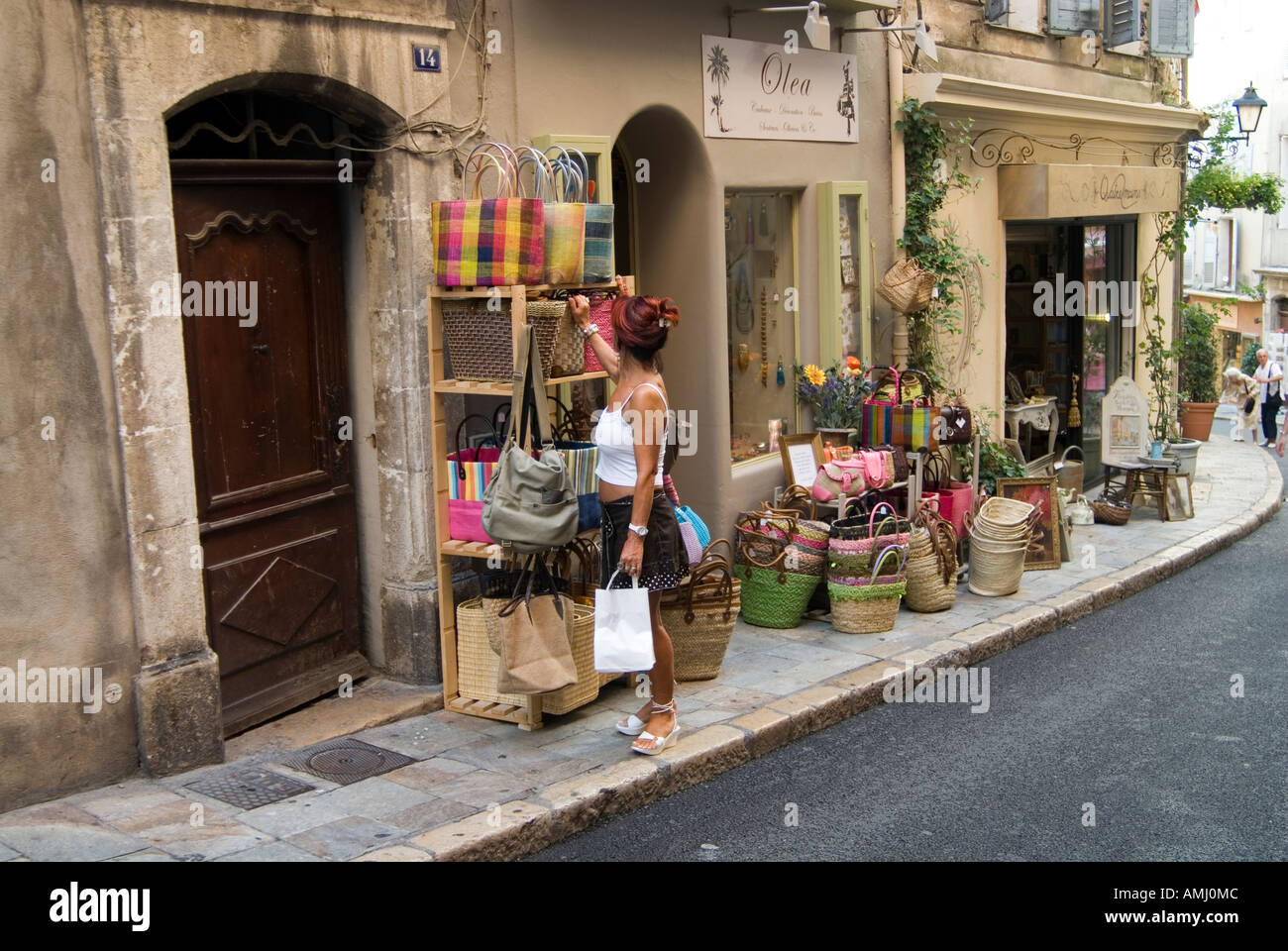 Shopping in the old part of Grasse France Stock Photo - Alamy