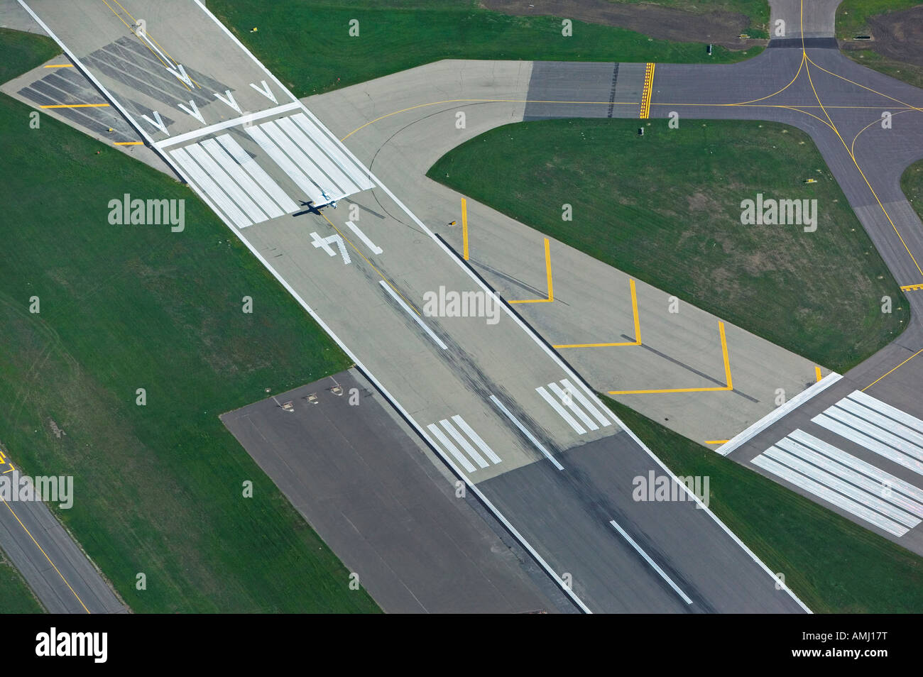 aerial view above airplane landing at runway 14 at Minneapolis Saint Paul Wold Chamberlain international airport KMSP Stock Photo