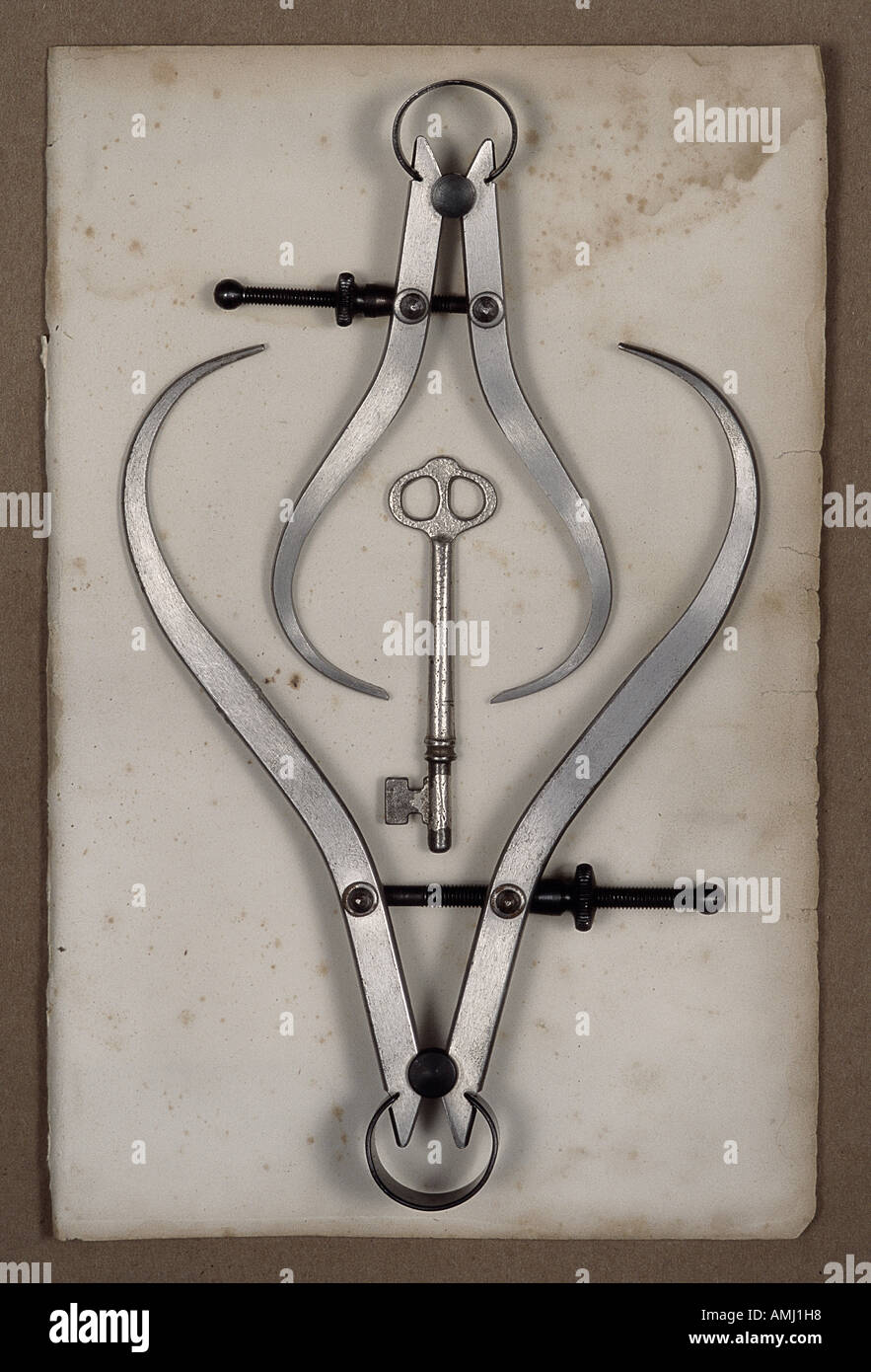 Calipers and Skeleton Key Stock Photo - Alamy