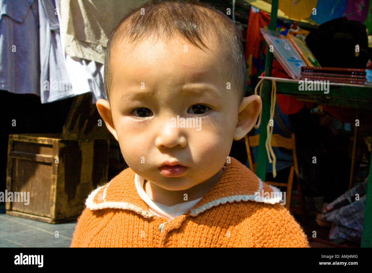 Adorable Young Chinese Boy West Street or Xi Jie Yangshuo China Stock Photo