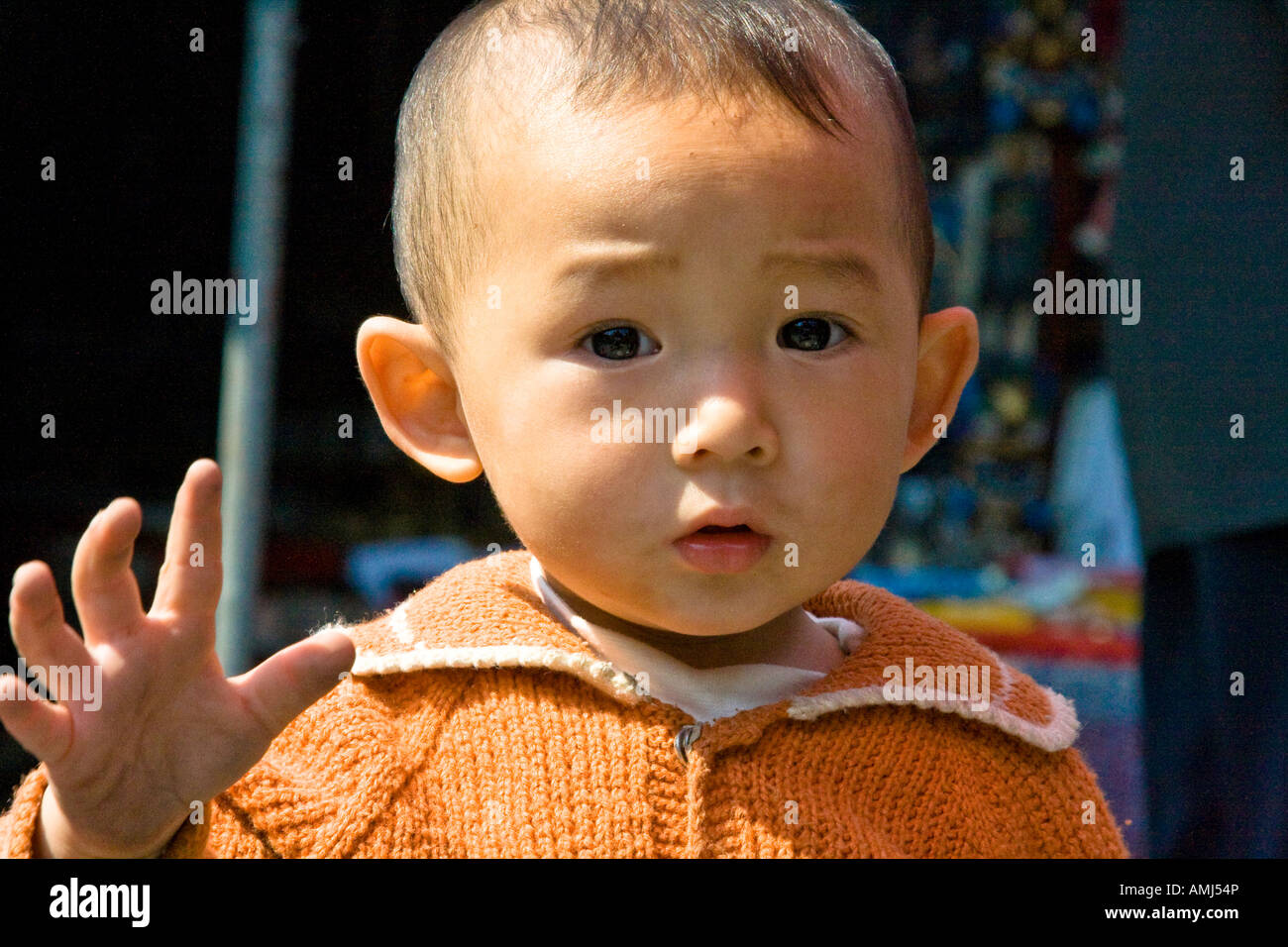 Adorable Young Chinese Boy West Street or Xi Jie Yangshuo China Stock Photo