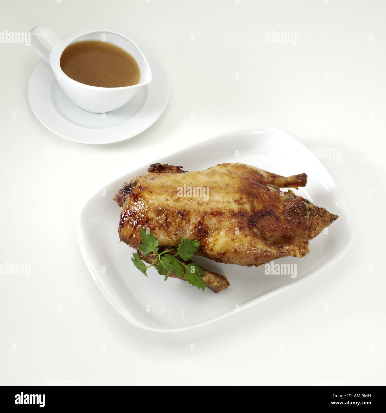Roasted duck and sauce Stock Photo - Alamy