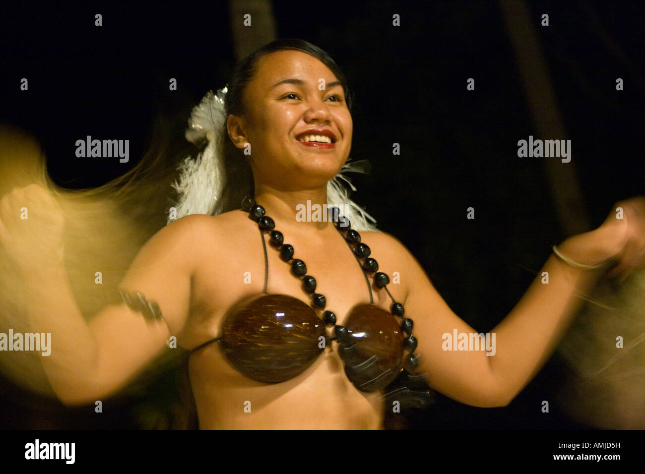 Young Palaun Woman Dancing Traditional Polynesian Dance, Palau Island Stock Photo