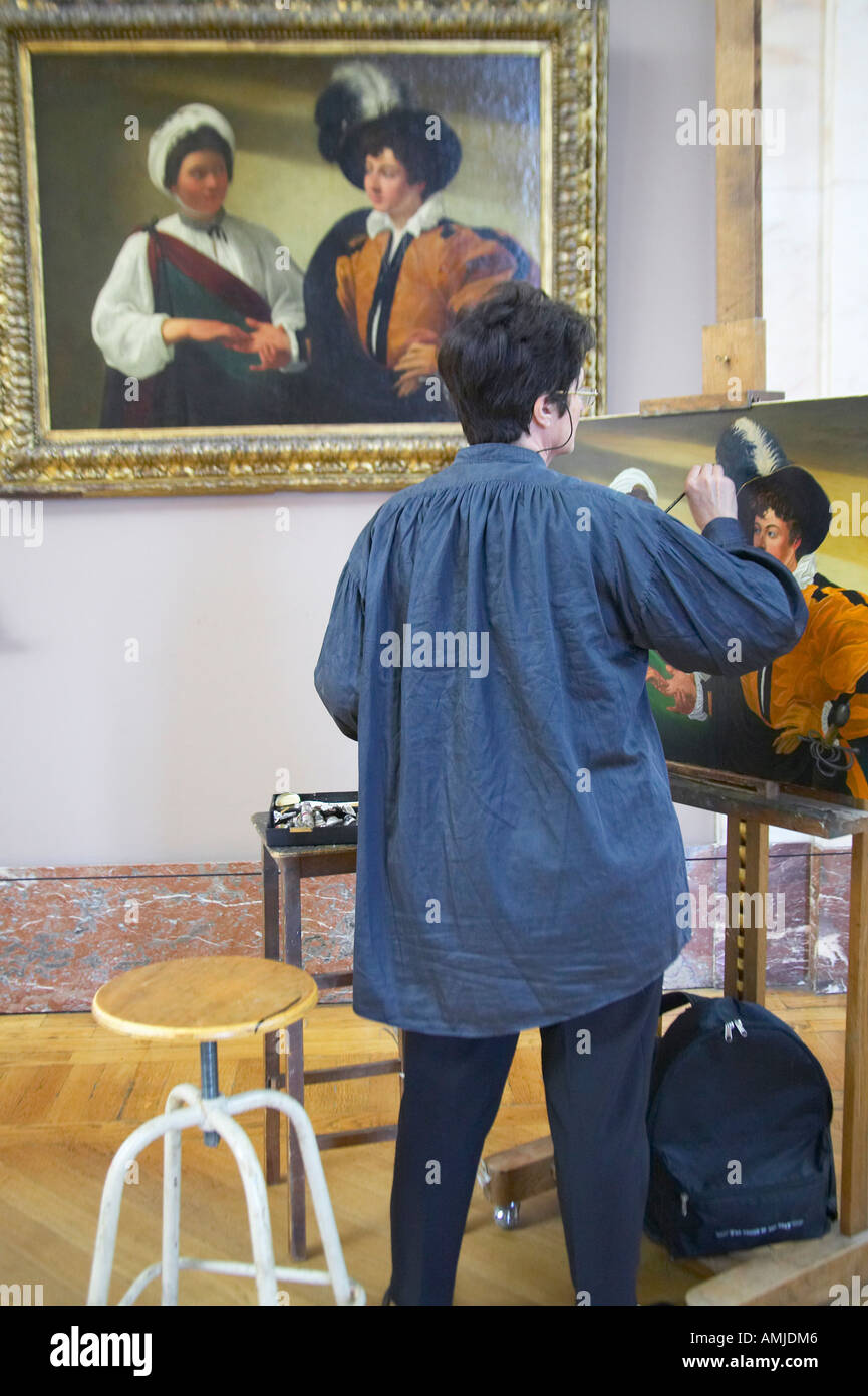 Artist copying a master painting at the Louvre Museum Paris France Stock Photo
