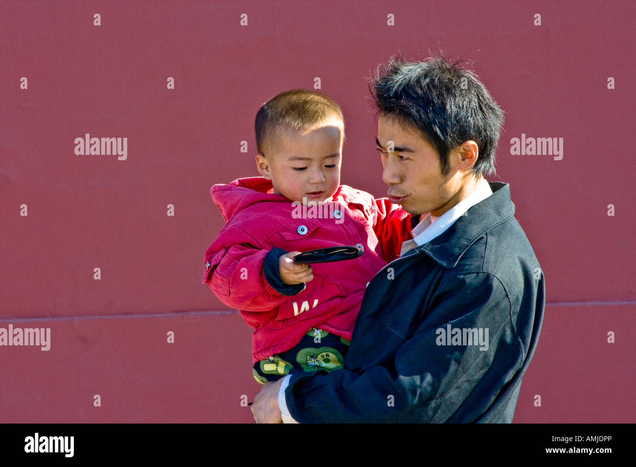 Chinese Father and Baby Boy Forbidden City Beijing China Stock Photo