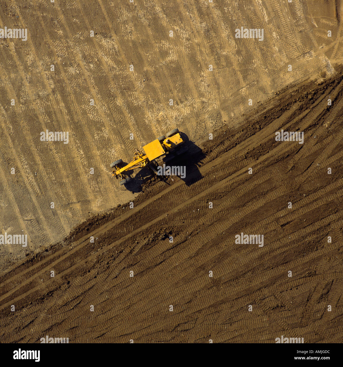 Tractor on landfill site overhead aerial view Stock Photo Alamy