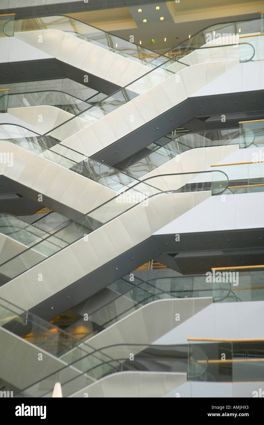Escalators in the interior of office building Paris France Stock Photo