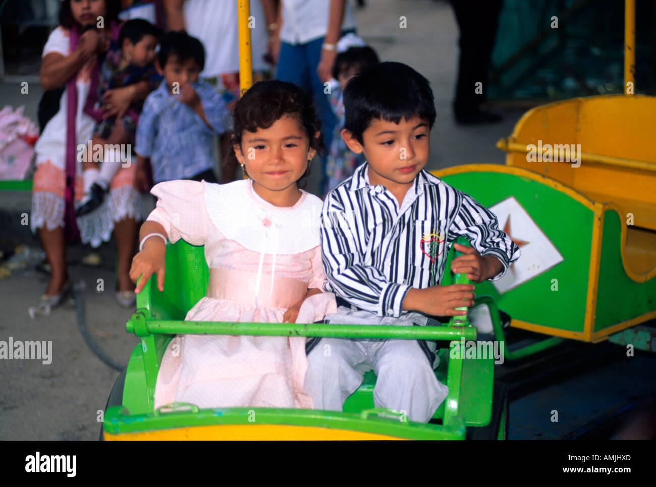 Mexiko, Yucatan, Hunucma bei Merida, Kinder im Karussel bei religiöser Fiesta Stock Photo