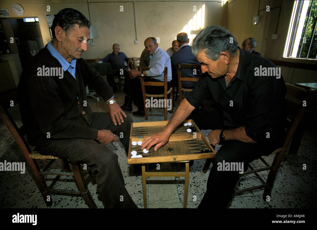men playing backgammon in a bar Stock Photo