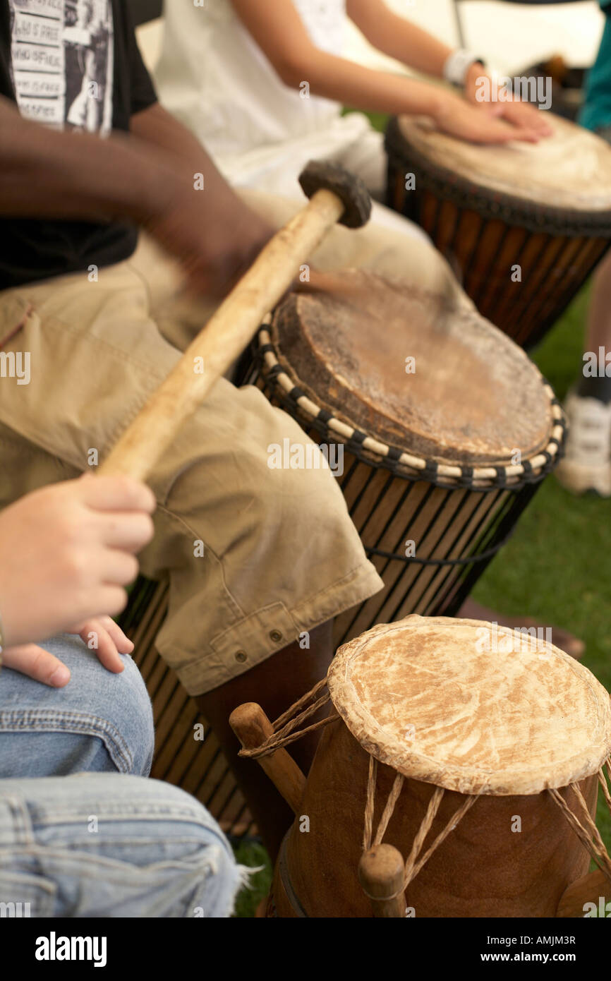 Playing African drums, UK Stock Photo Alamy