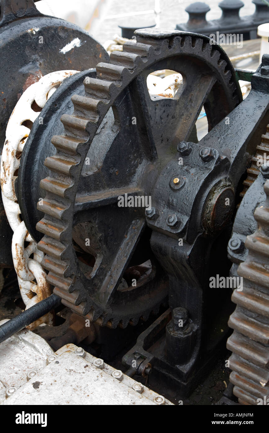 greased old winch gear wheel showing cog teeth Stock Photo Alamy