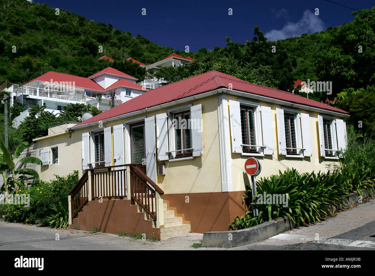Pastel yellow house with red tin roof Gustavia St Barts Stock Photo Alamy