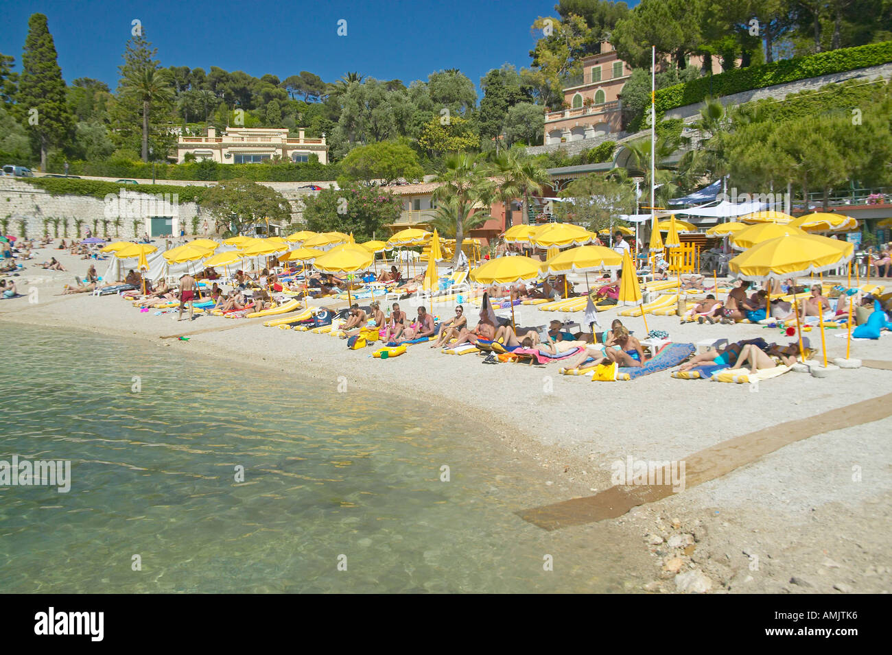 French Riviera Bathing Sunbathers on beach on French Riviera France Stock Photo - Alamy