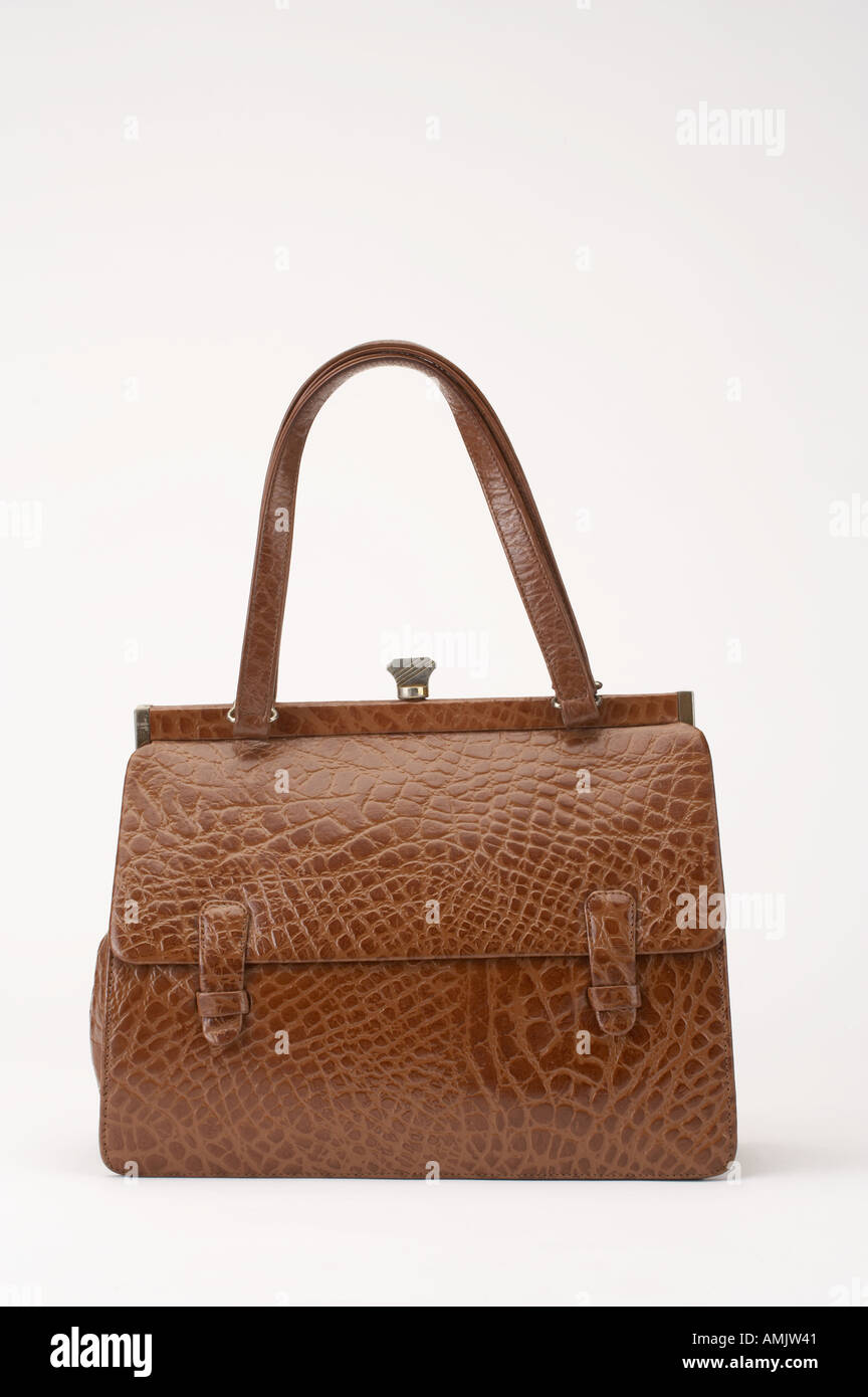 brown ladies crocodile skin handbag on white background AMJW41