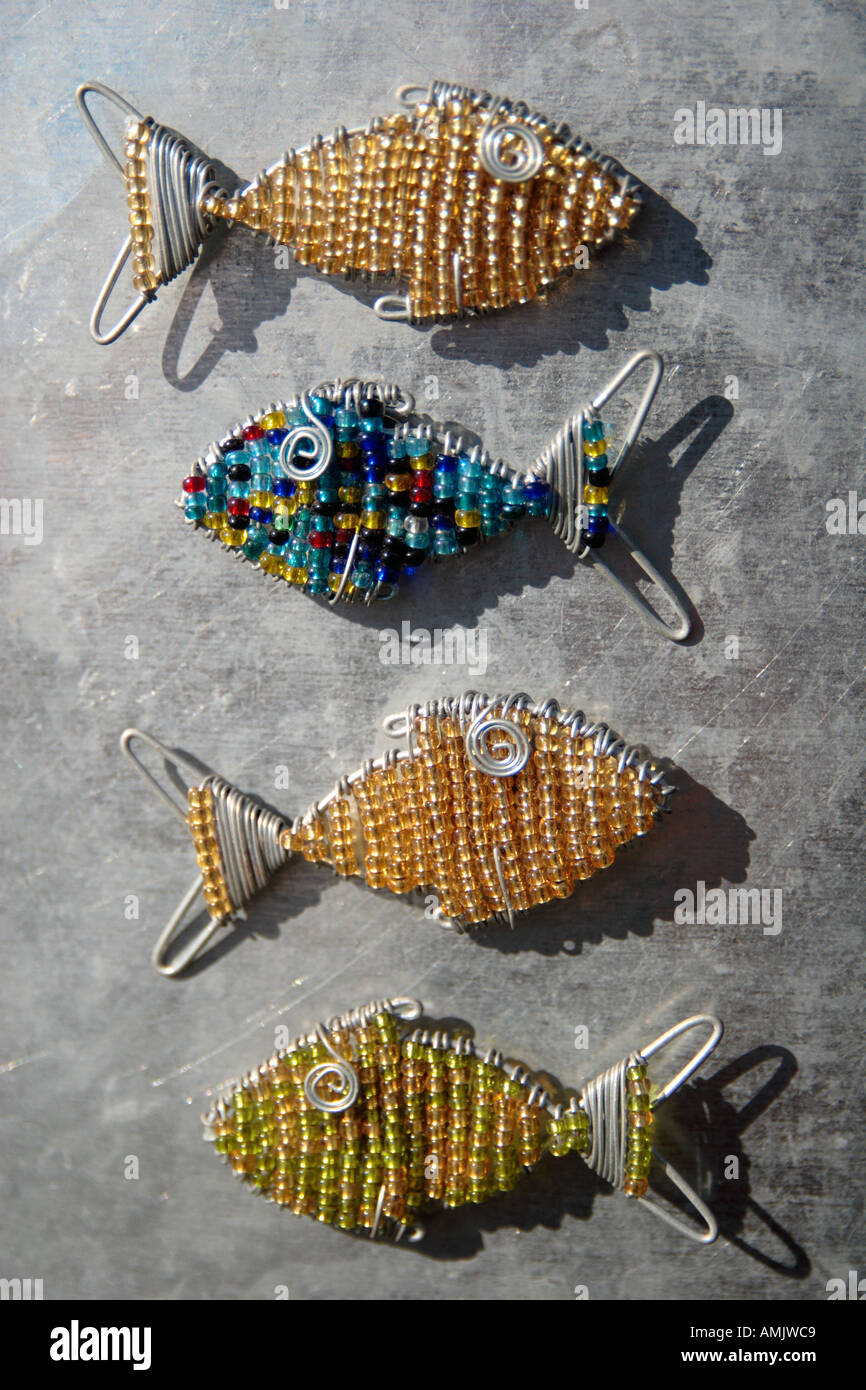 Four beaded wire fish South Africa Stock Photo - Alamy