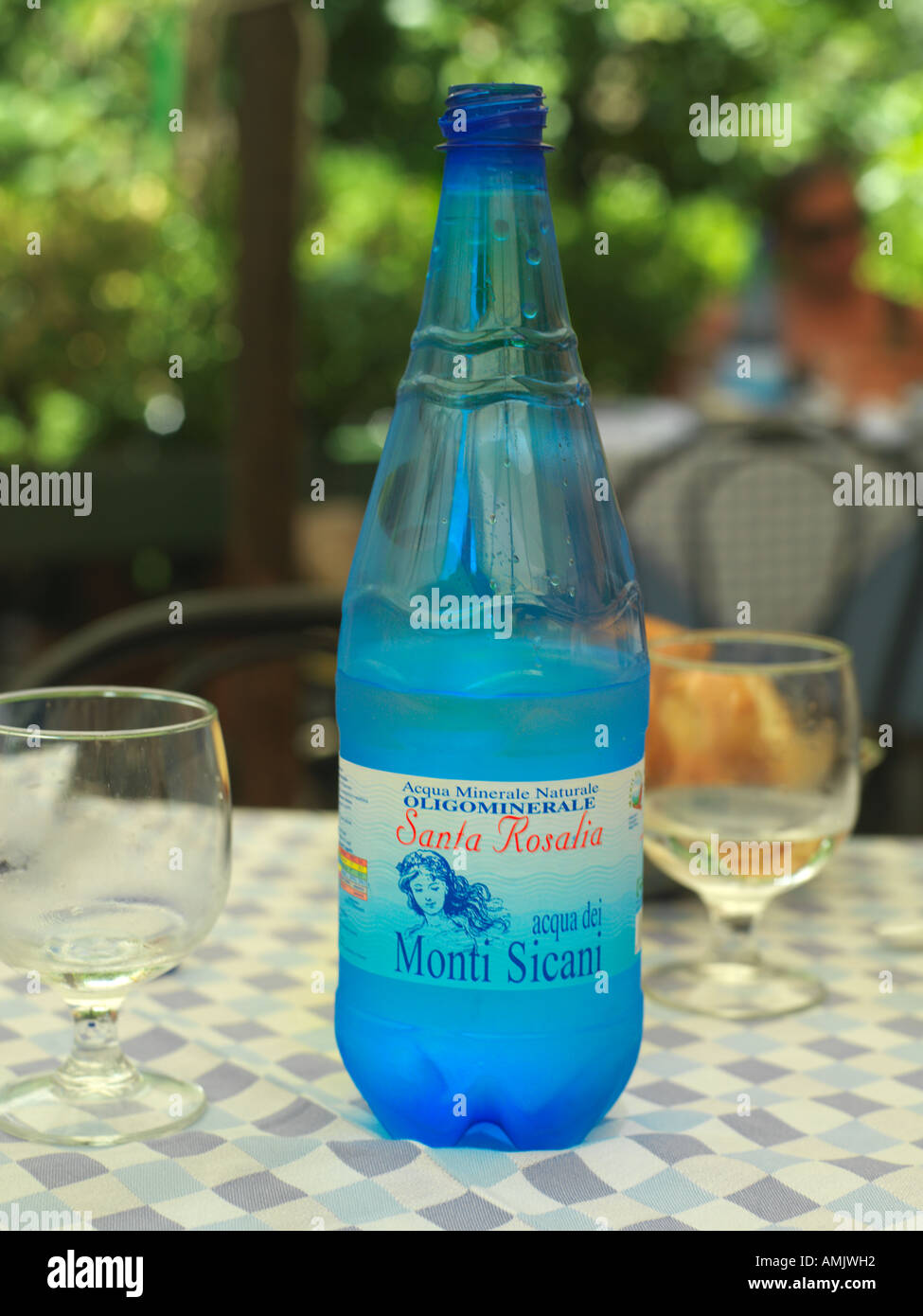 Piazza Bellini Palermo Sicily Italy Pizzeria Bellini Bottle of Mineral Water from Monti Sicani Santa Rosalia Stock Photo