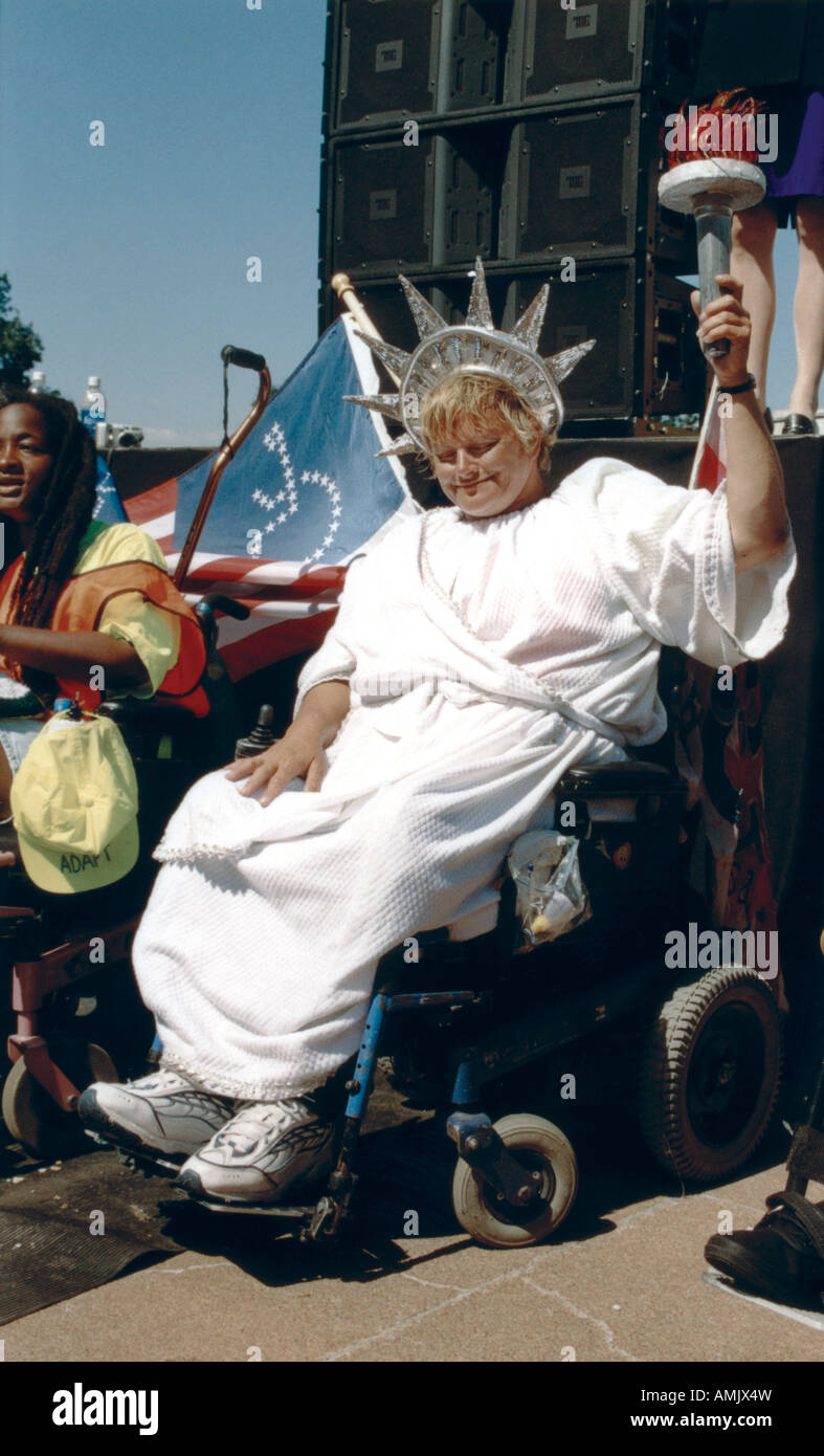 Woman with a disability in a wheelchair dressed as the Statue of ...