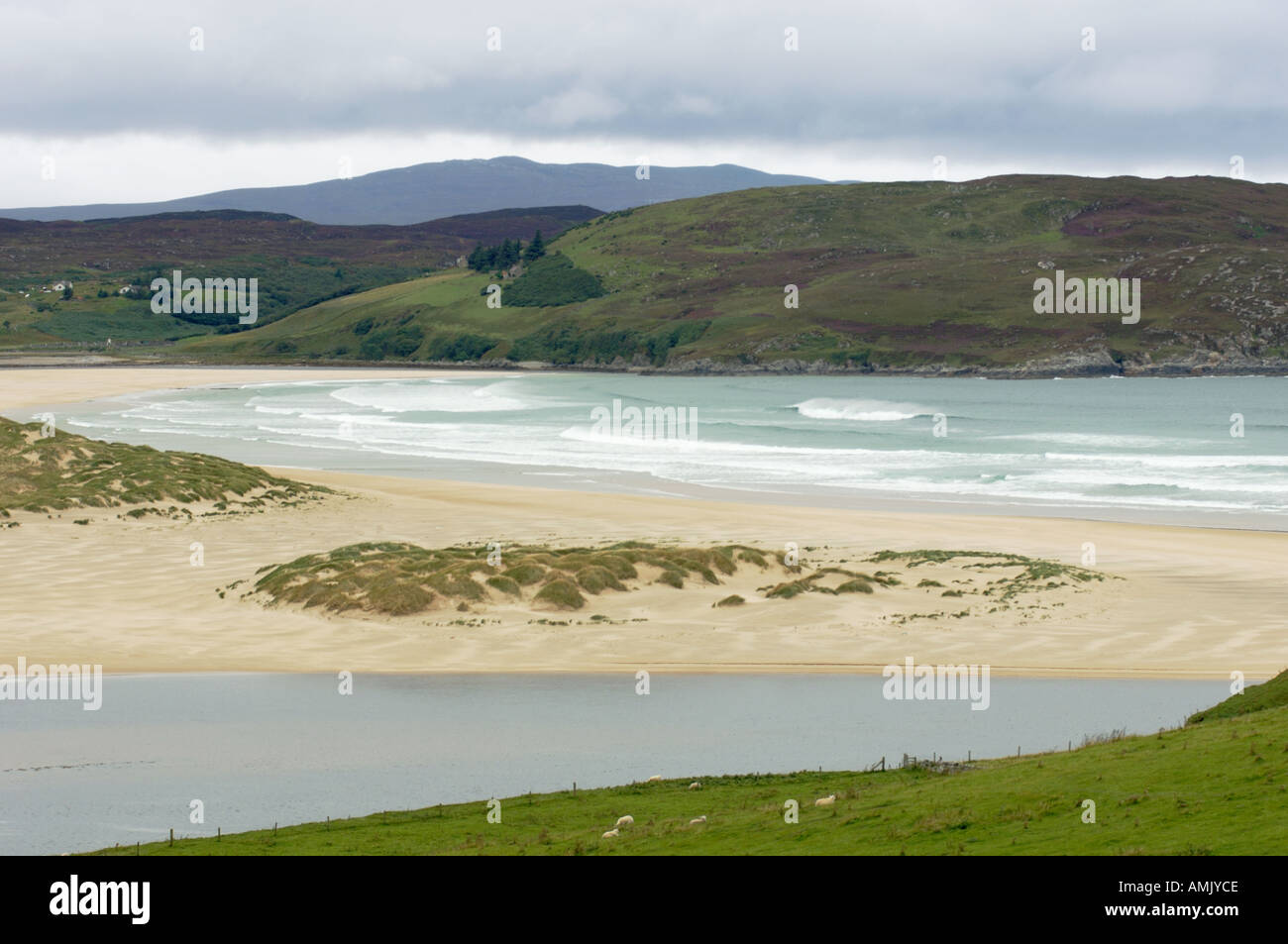 The River Naver flows into Torrisdale Bay at Invernaver, Bettyhill, Sutherland, on Scotlands north coast. Stock Photo