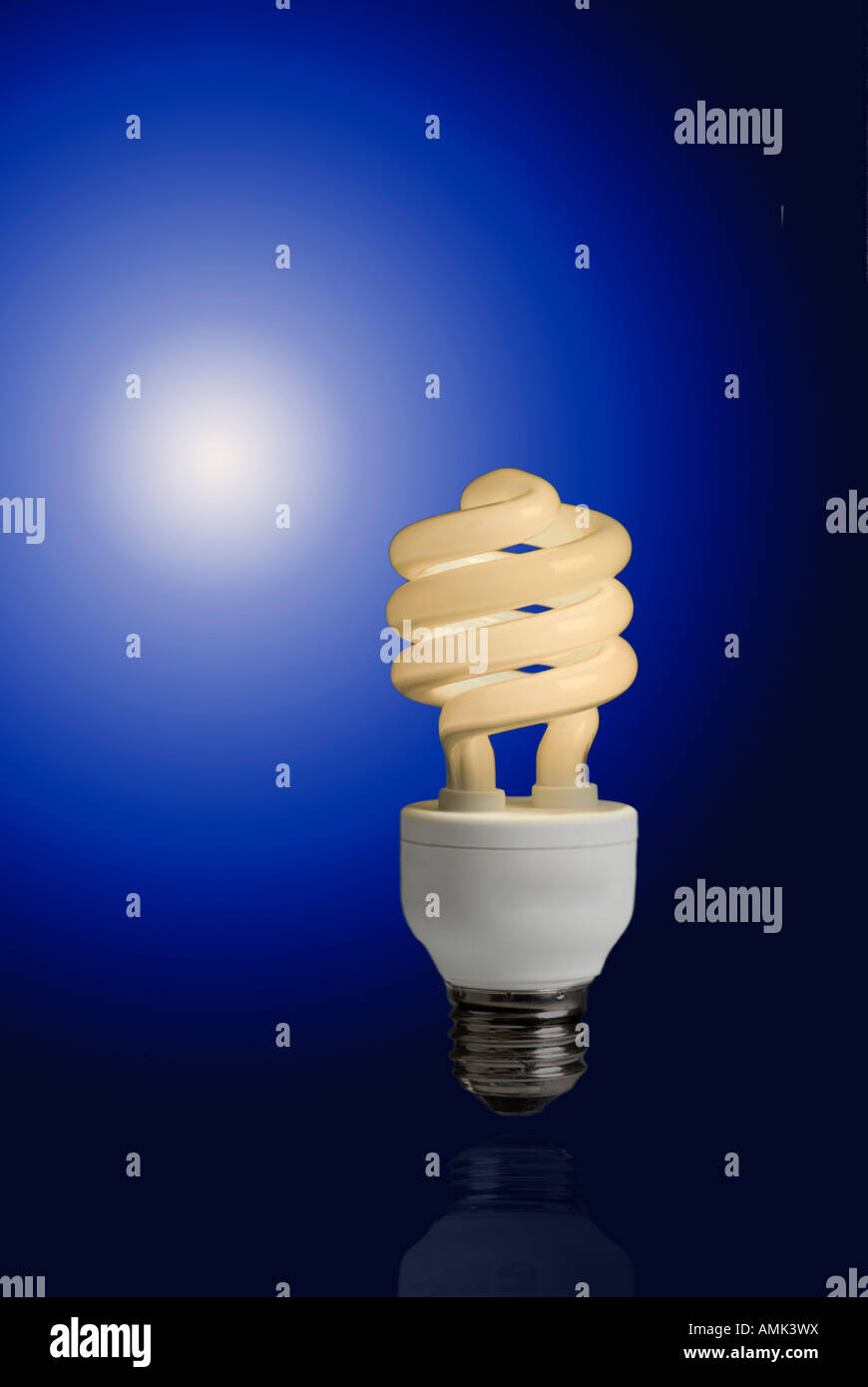 A new compact fluorescent light bulb against a deep blue gradient, these light bulbs save money