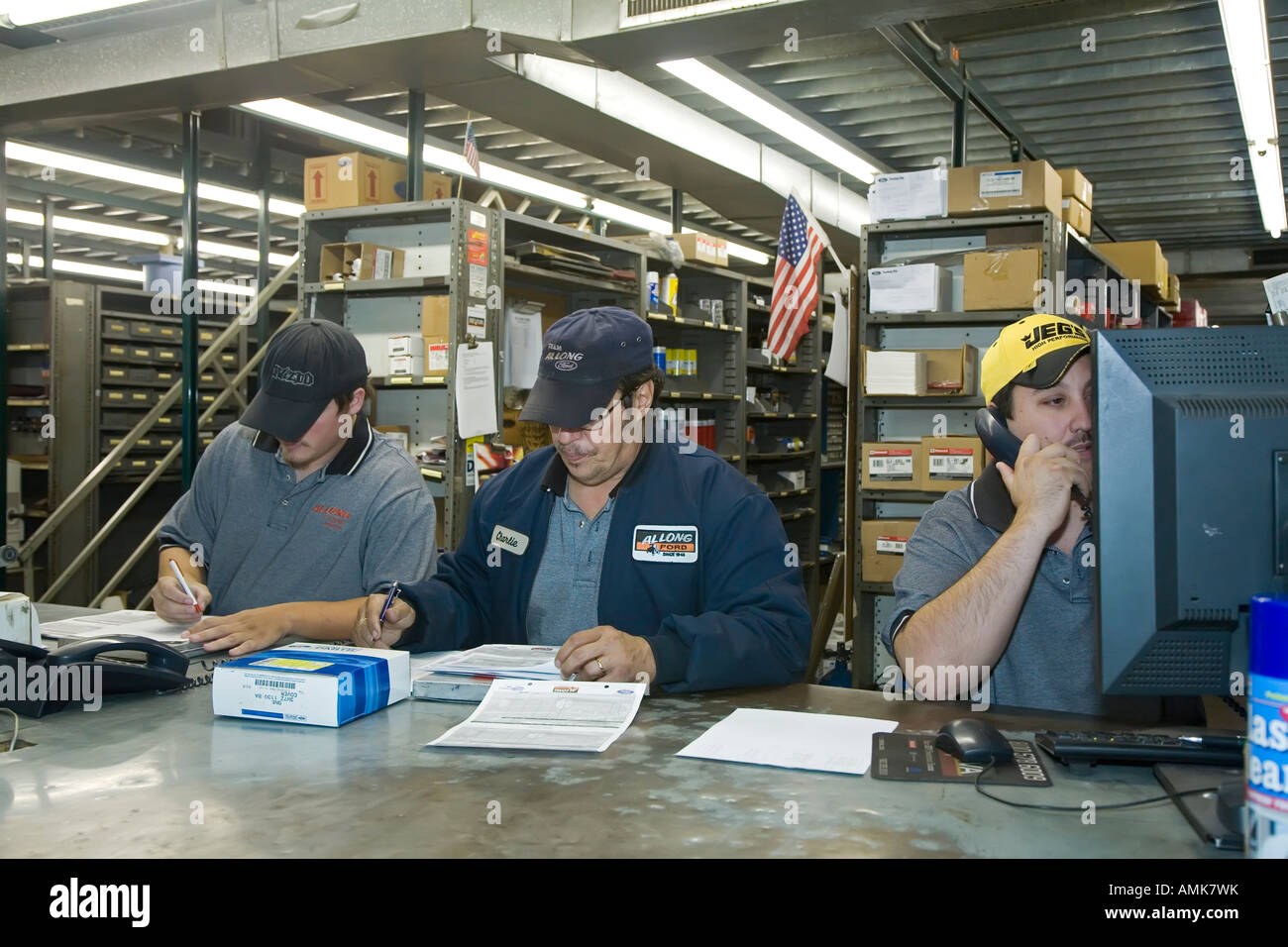 Warren Michigan Workers in the parts department at Al Long Ford prepare