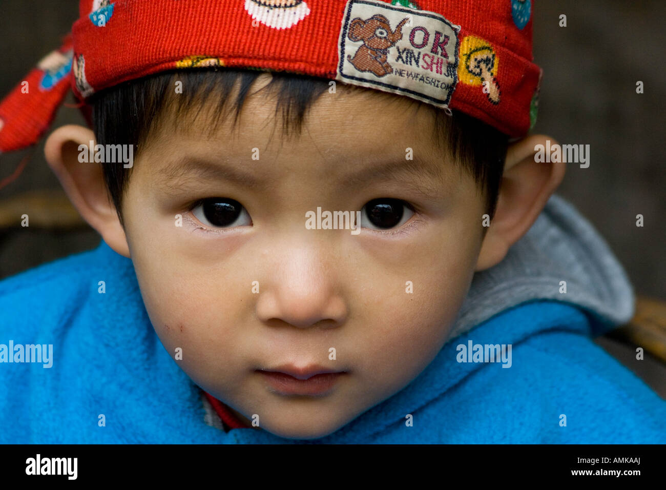 Young Boy Playing in the Hutong Beijing China Stock Photo