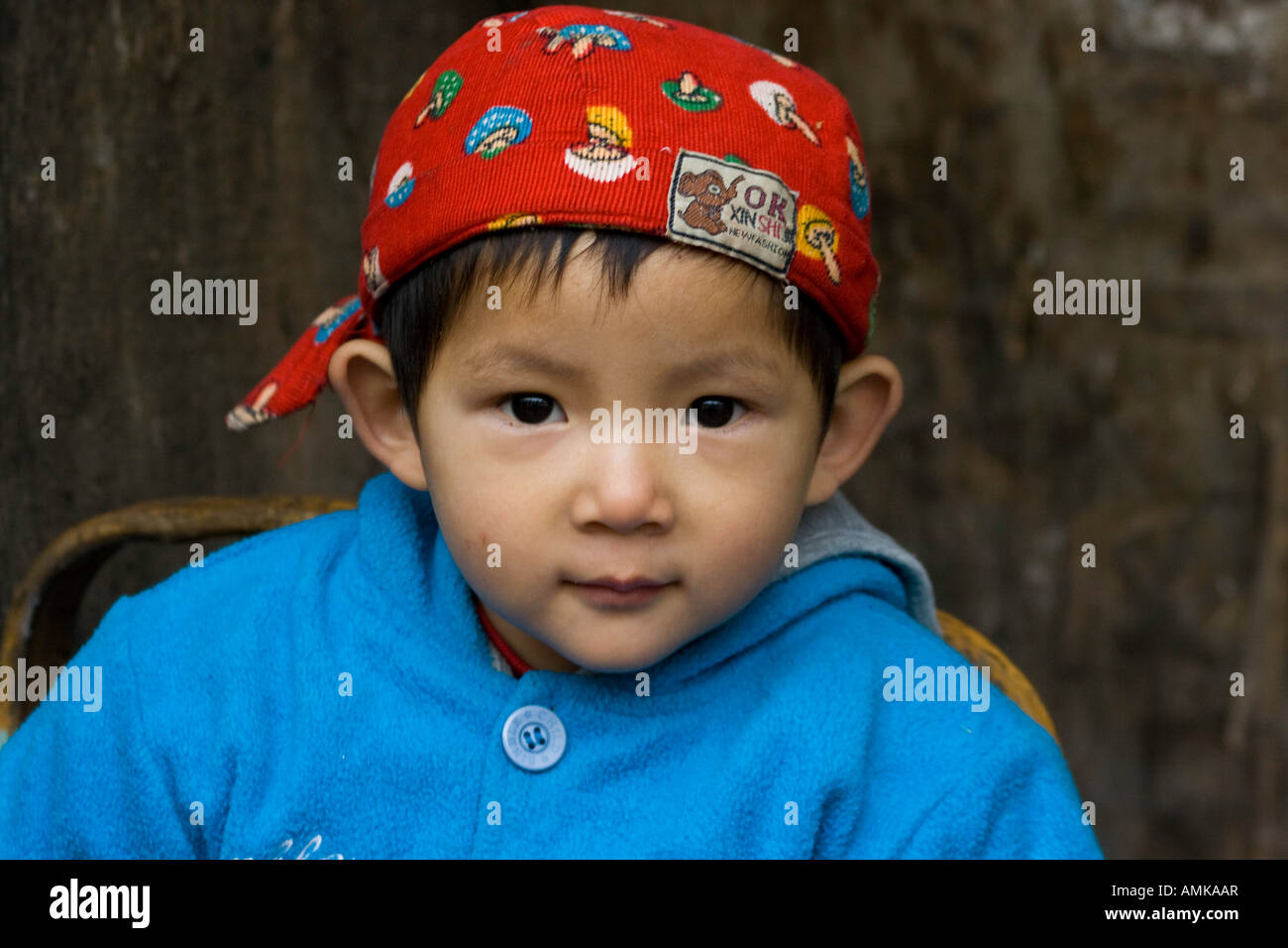 Young Boy Playing in the Hutong Beijing China Stock Photo