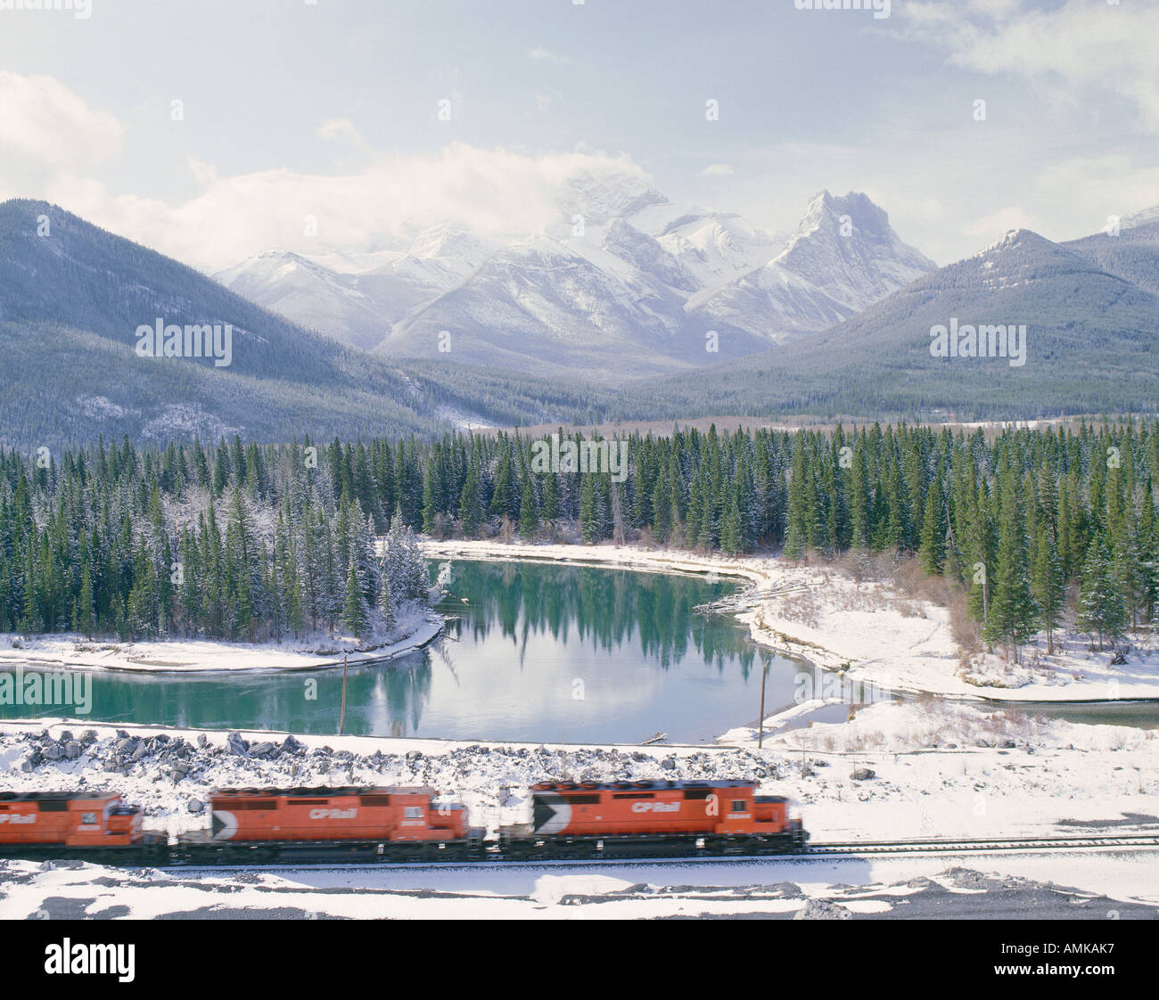 Train by Mount Lougheed and Bow River, near Dead Mans Flats, Alberta