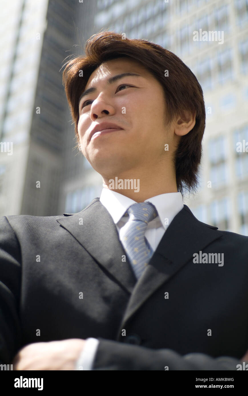Asian smiling young businessman hi-res stock photography and images - Alamy