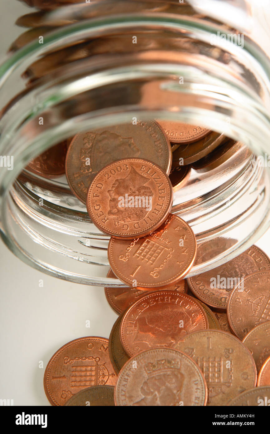Jar of pennies money saving Stock Photo