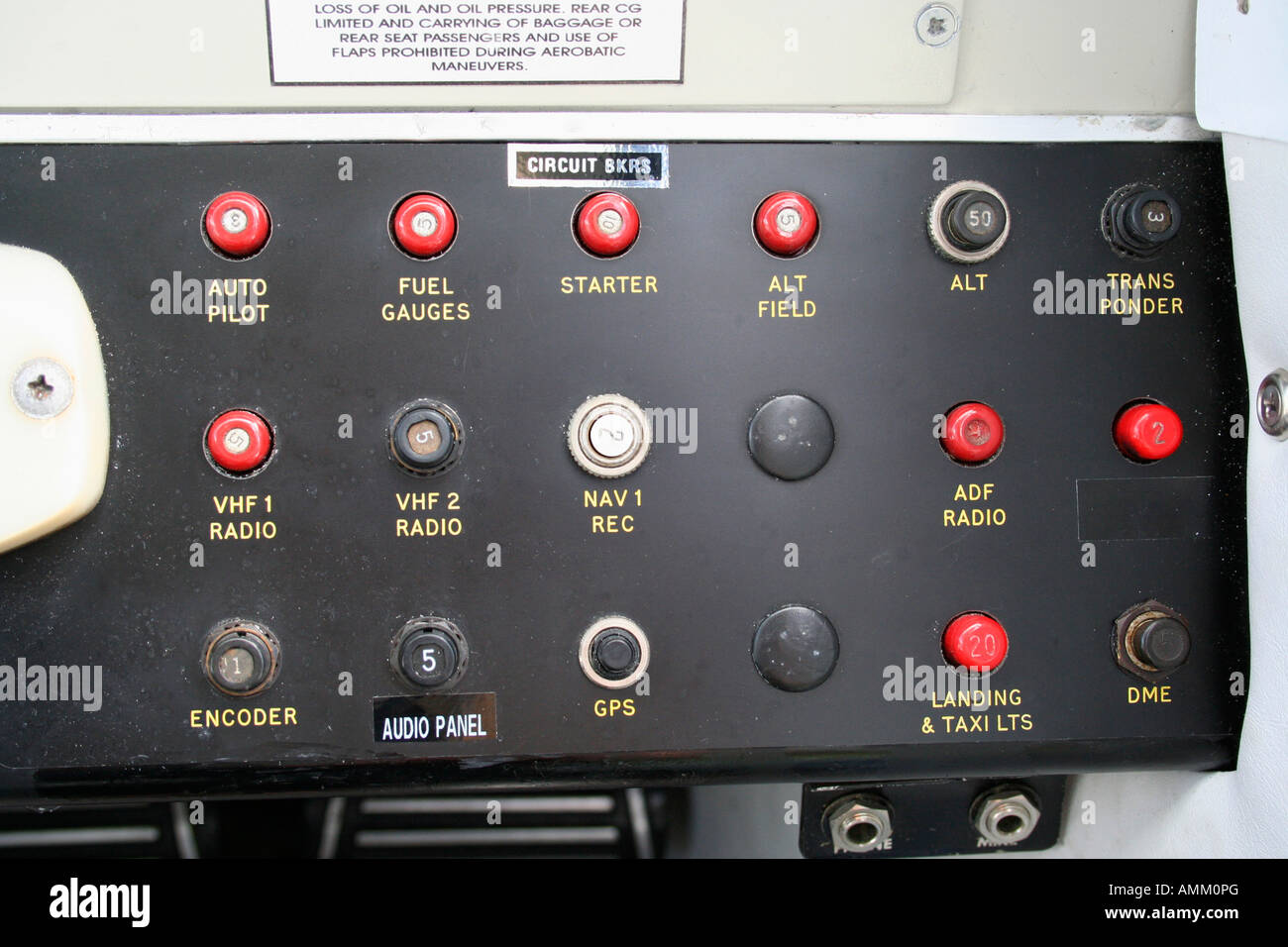 Circuit breakers in a Beechcraft Sundowner single engine airplane Stock