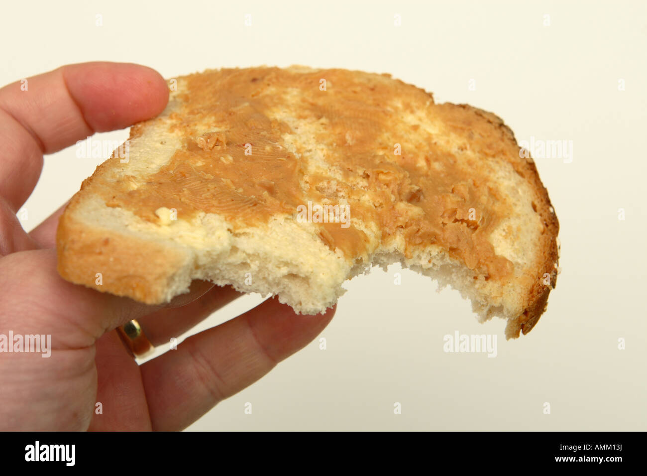 Eating a peanut butter sandwich Stock Photo