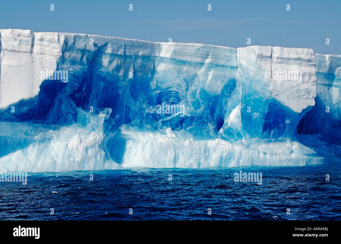 Tabular iceberg with large deep blue horizontal vein Stock Photo