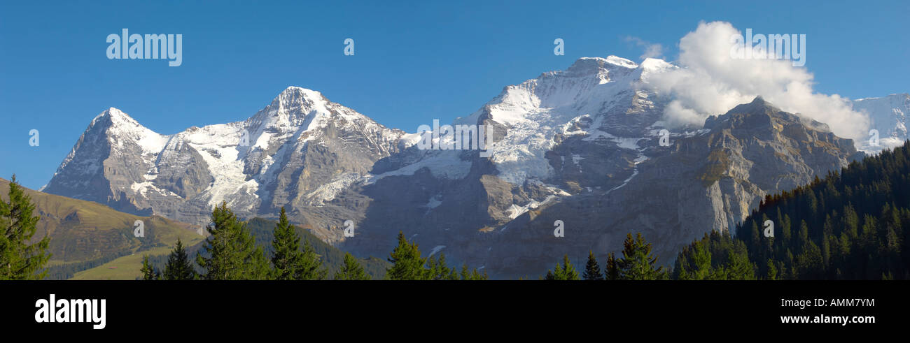 Panoranic of Jungrau Eiger Mountain range  Swiss Alps. From left, The Eiger. Monch, The Jungrau Stock Photo