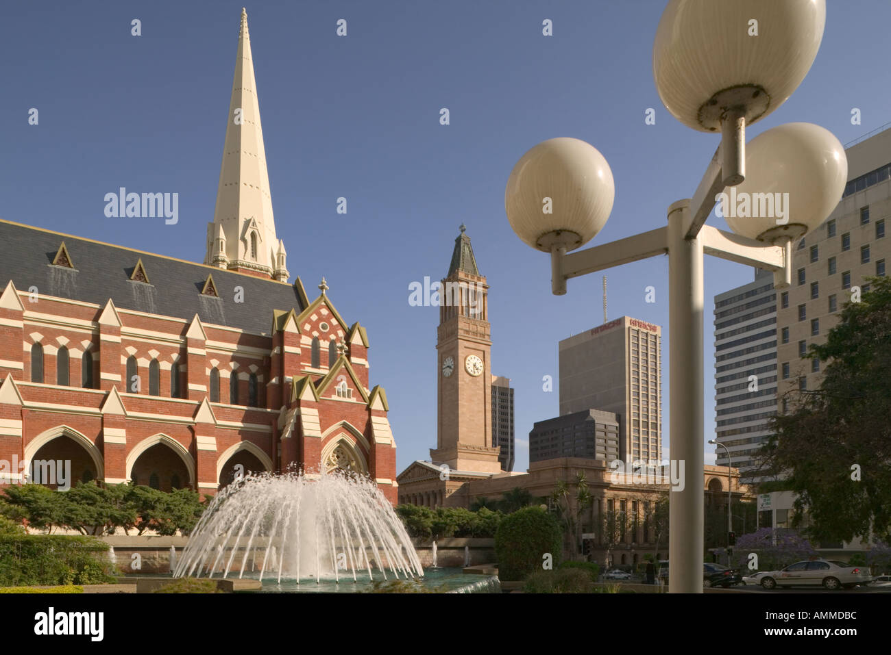View of City Hall in King George Square, Brisbane with Albert Street Union Church in the foreground. Stock Photo