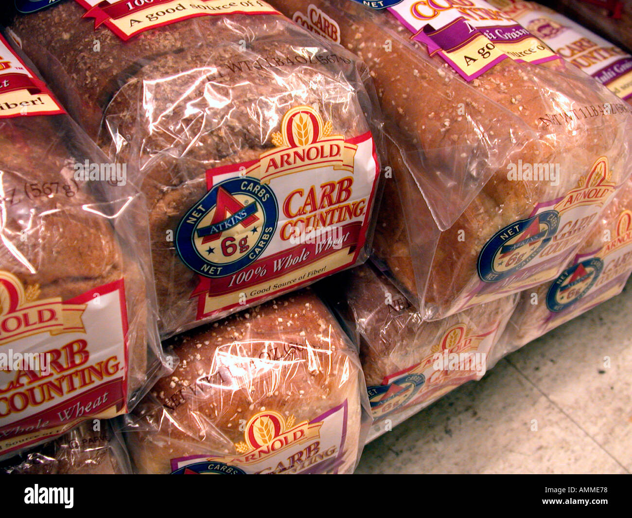 A display of Arnold Carb Counting whole wheat bread on a supermarket shelf Stock Photo Alamy