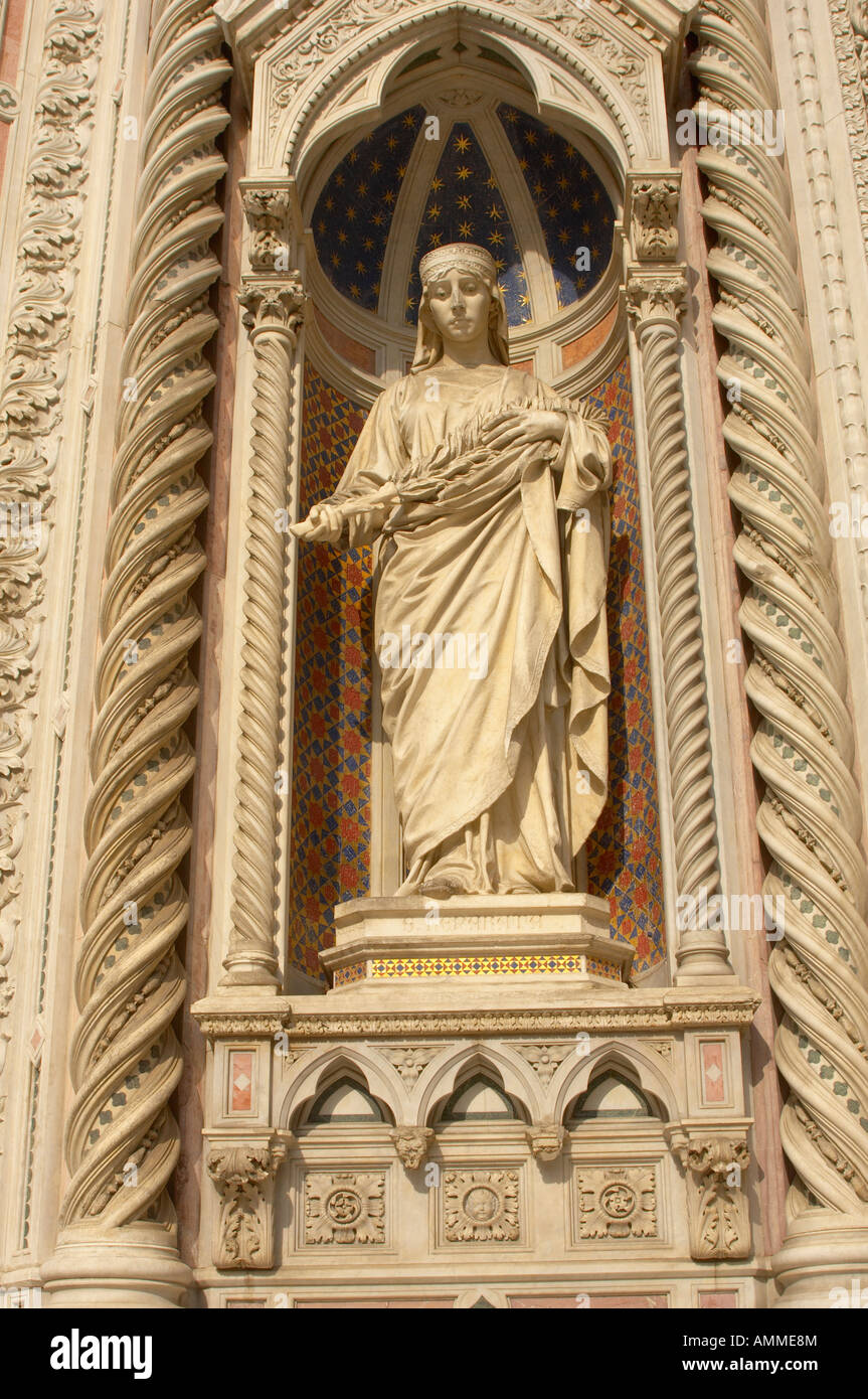 Statue Of Saint Mary Of The Flowers on the facade of Florence Duomo (Cattedrale di Santa Maria del Fiore , Florence Italy Stock Photo