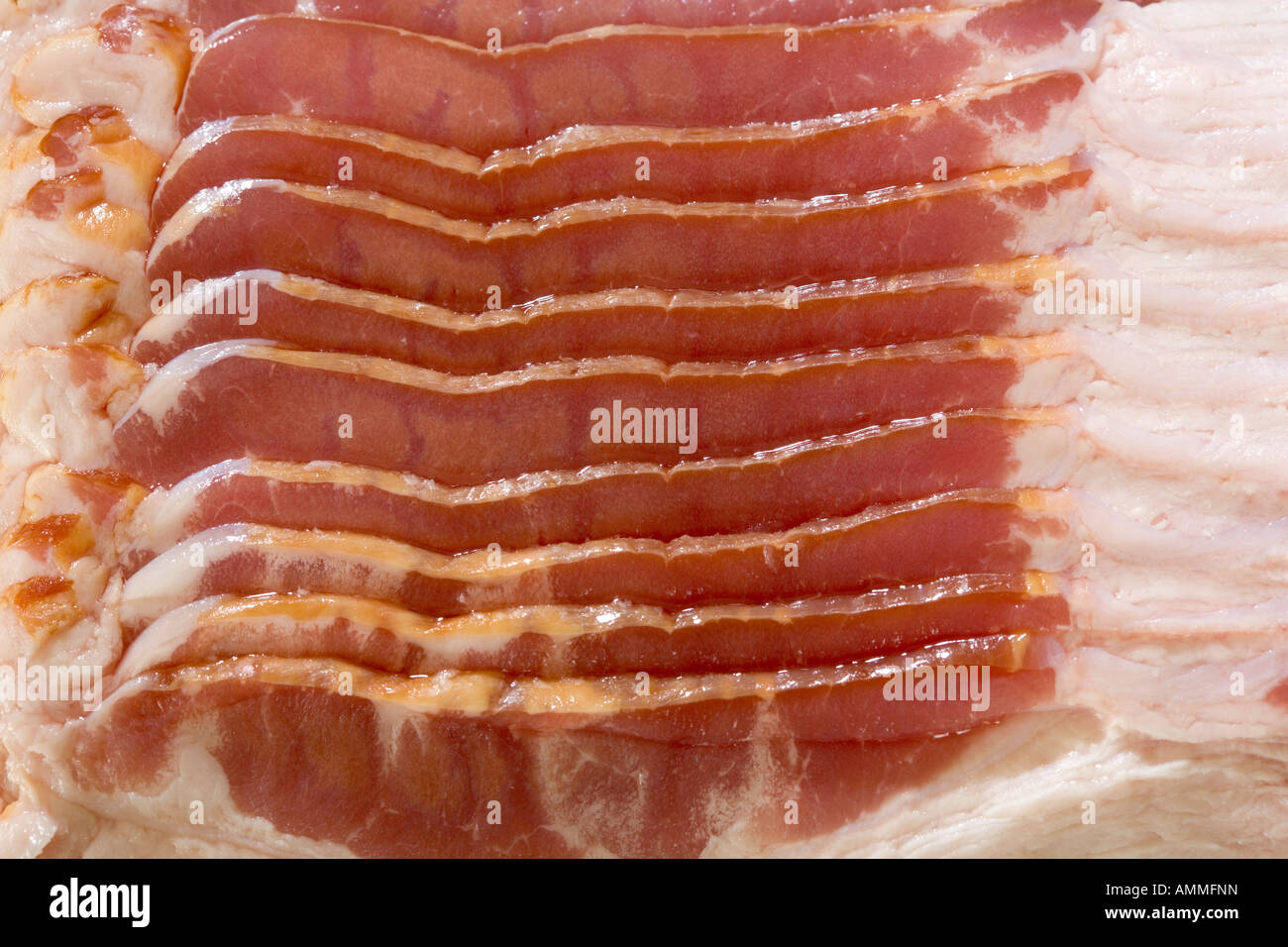 raw bacon close up showing bands of fat Stock Photo Alamy