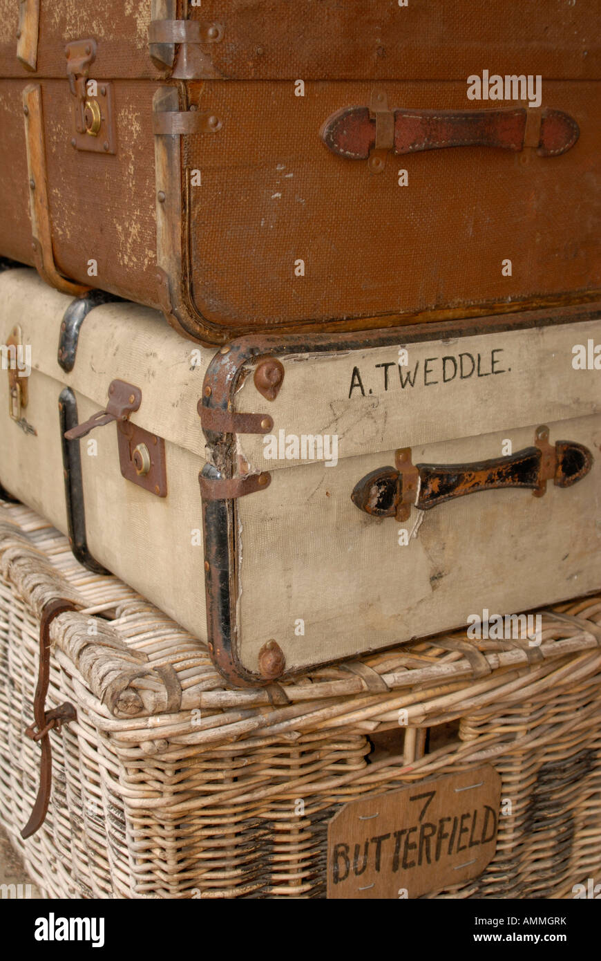 Old fashioned style suitcases pilled high Stock Photo Alamy