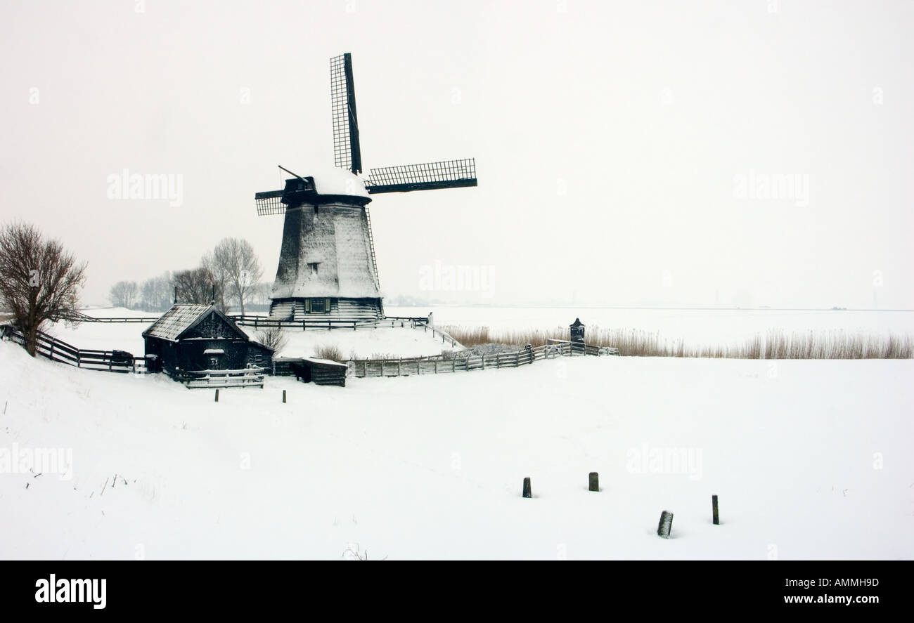 Windmill in winter landscape Stock Photo