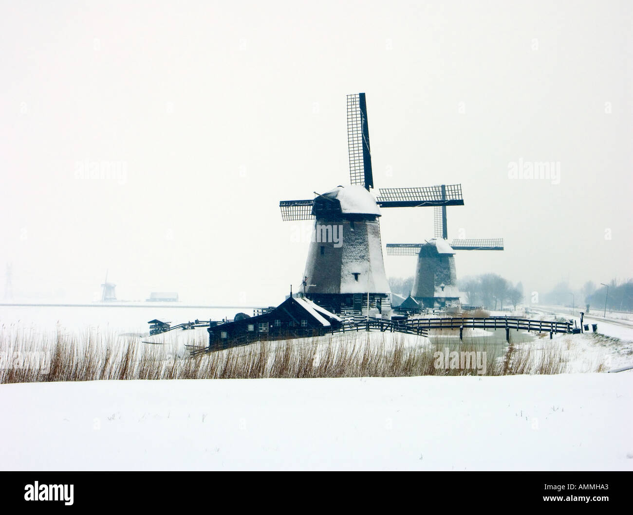 Windmills in winter landscape Stock Photo