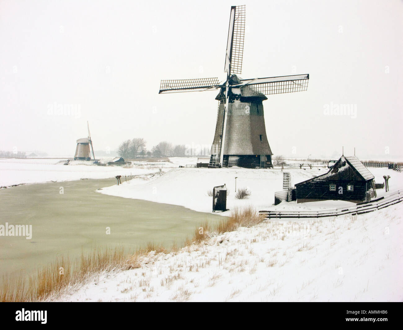 Windmill in winter landscape Stock Photo