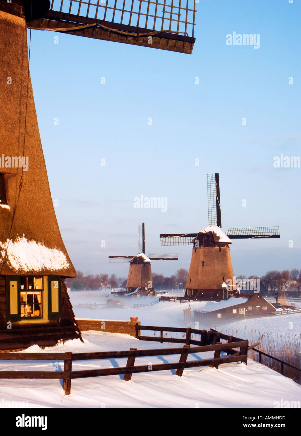 Windmills in winter landscape Stock Photo