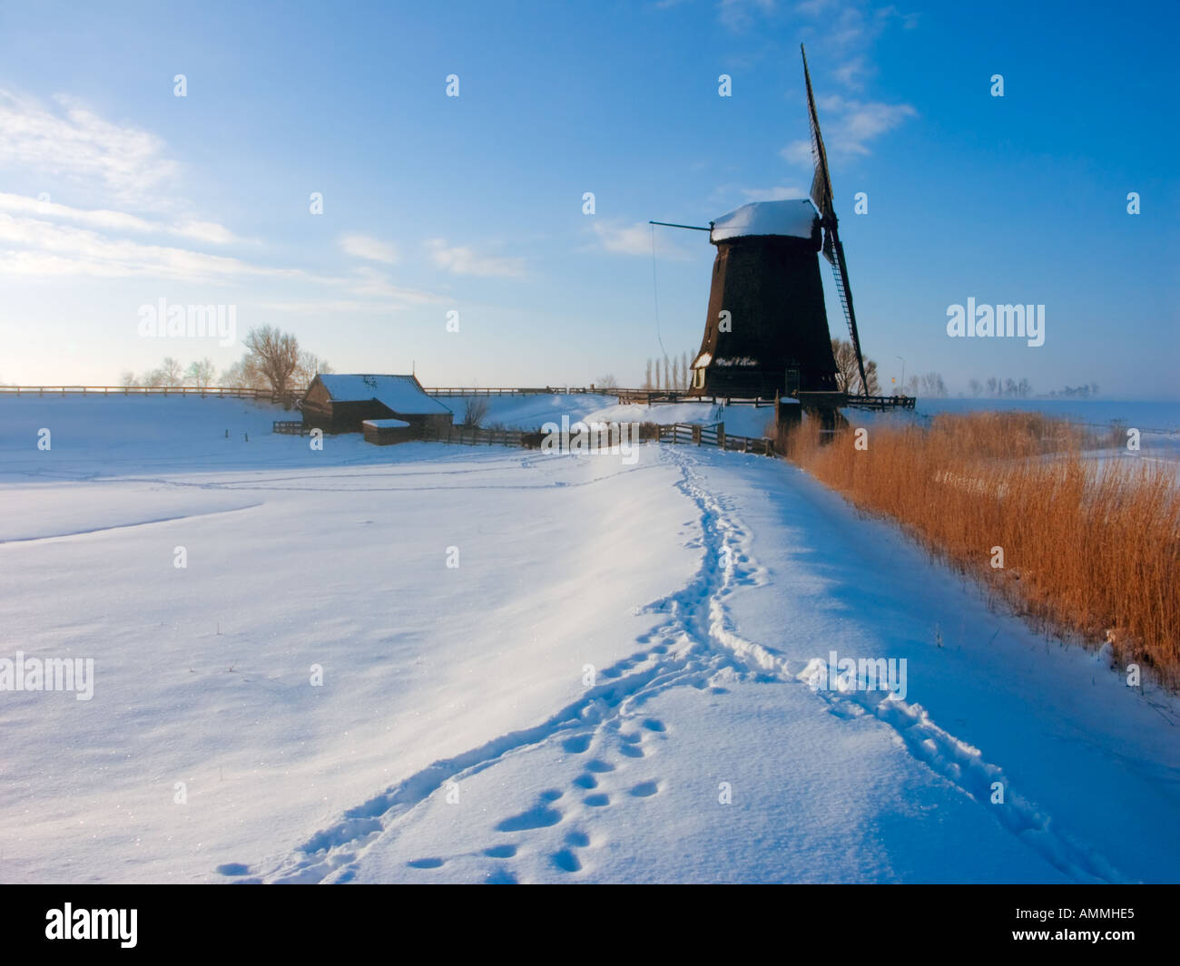 Windmill in winter landscape Stock Photo