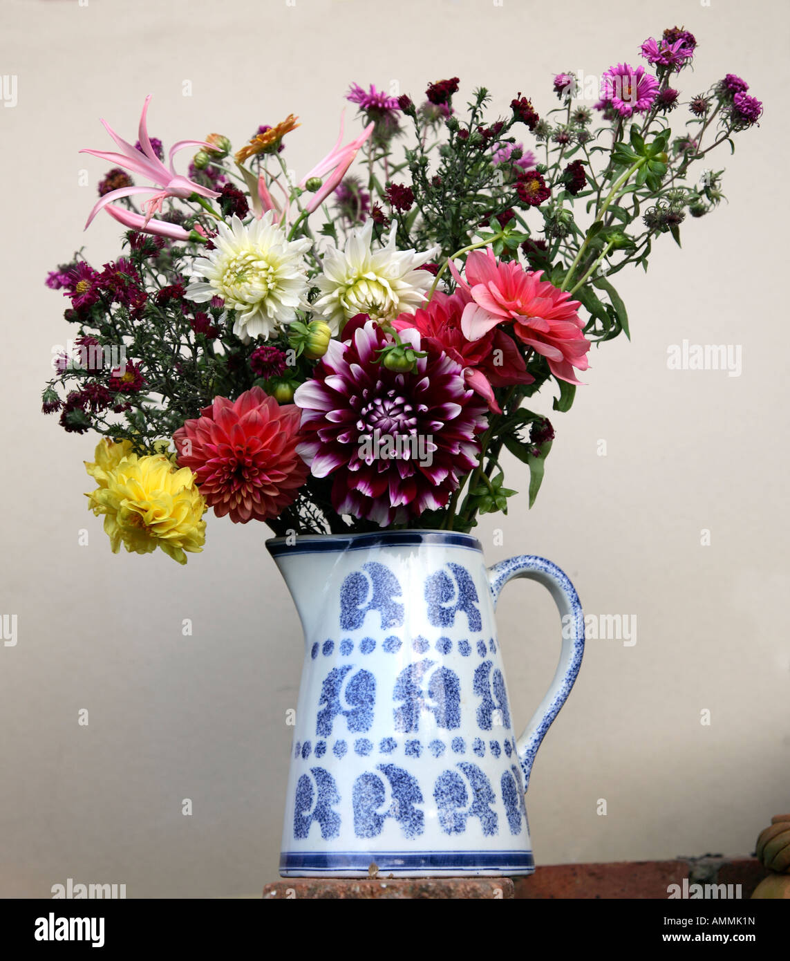 Cut flowers in a jug Stock Photo Alamy
