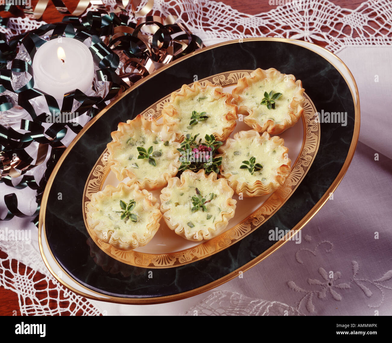 festive holiday party platter goat cheese spinach tarts Stock Photo