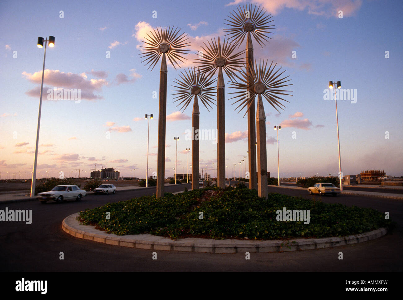 Jeddah Saudi Arabia Sculptures At Sunset Cumulus Clouds Stock Photo