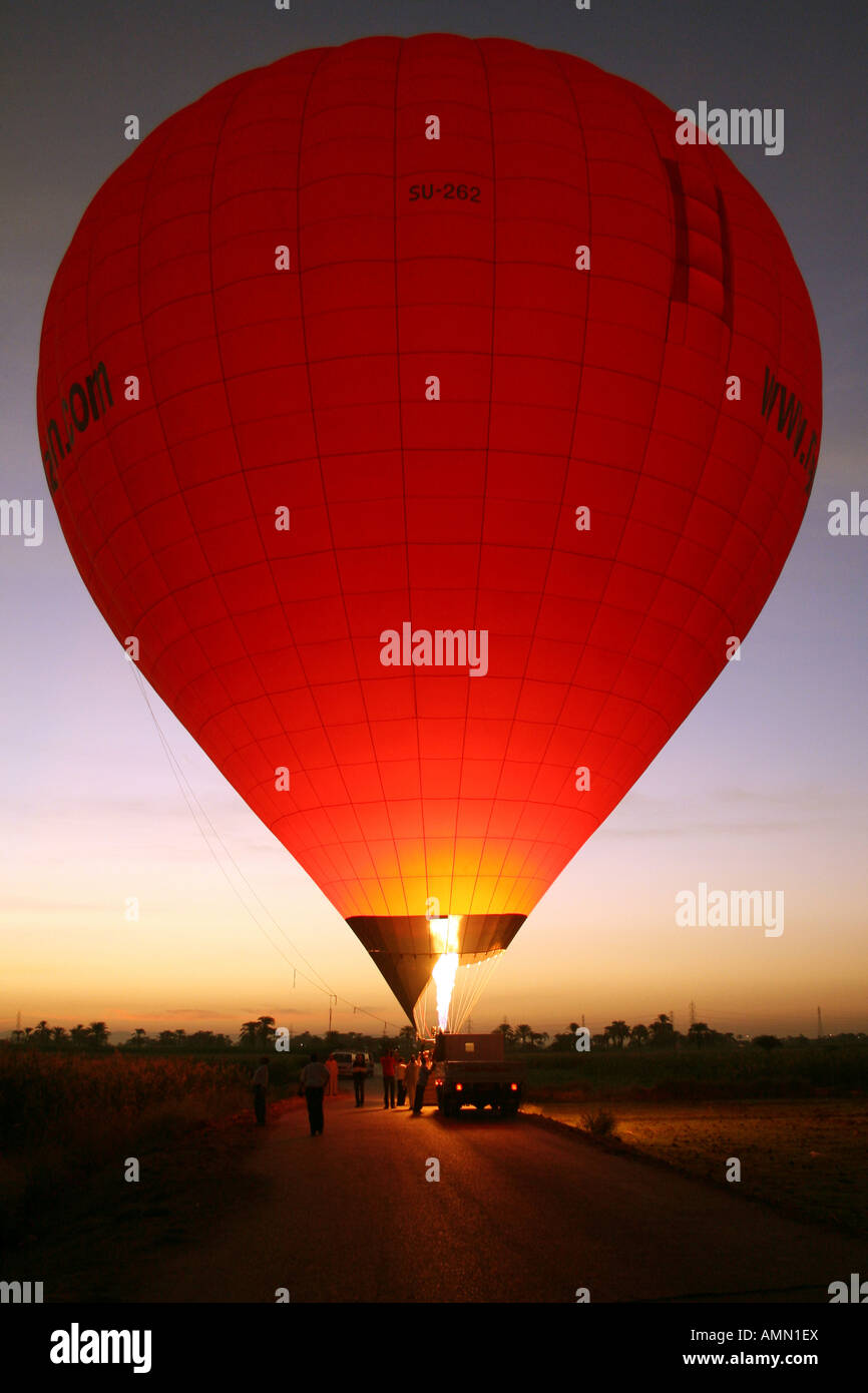 Hot Air Balloon Firing at Sunset before Lift Off [River Nile, Near Luxor, Egypt, Arab States, Africa].                         . Stock Photo